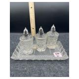 3 SALT & PEPPERS ON GLASS TRAY