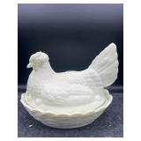 LIGHT GREEN HEN ON  NEST