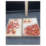 2 BOXES OF RED NECKLACES & EARRINGS