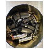 TIN WITH ASSORTED IMPACTS