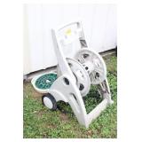 HOSE REEL AND (2) GARDEN HOSES