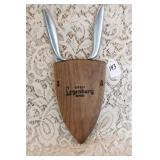 PAIR GERBER KNIVES IN WOOD WALL PLAQUE