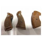 (3) WOODEN PISTOL GRIPS - 2 ARE S & W