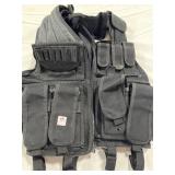 BLACK TACTICAL VEST - BRAND/SIZE UNKNOWN