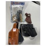 (4) GUN HOLSTERS (ASSORTED TYPES/SIZES)