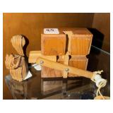 This is a handcrafted wooden toy likely known as