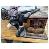 Hand -carved wooden sculpture often referred to