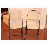 PAIR POLY AND METAL FOLDING CHAIRS