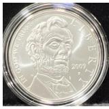 2009 ABE LINCOLN COMM. UNC SILVER DOLLAR -
