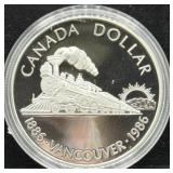 1986 VANCOUVER PROOF SILVER DOLLAR -