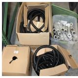 Boxes of Flexible Black Tubing w/ White Tubes