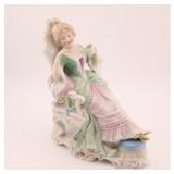 UNMARKED PORCELAIN FIGURINE