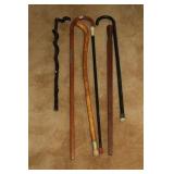 4 WALKING STICKS &  2 CANES