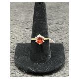 14K GOLD AND LAB CREATED RUBY SOLITAIRE RING -