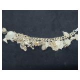 STERLING SILVER CHARM BRACELET W/26 CHARMS -