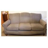 Classic Camelback Style Beige Upholstered Sofa