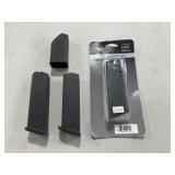 (3) GLOCK .40 CAL MAGAZINES & (1) LOAD ASSIST