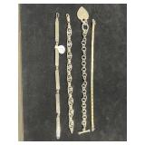(4) STERLING SILVER BRACELETS - ASSORTED DESIGNS
