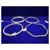 (4) STERLING SILVER BANGLE BRACELETS - ASSORTED -