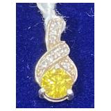Elegant Yellow Gem & Crystal Swirl Pendant