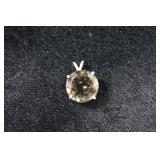 Round Faceted Brownish Gemstone Pendant