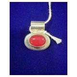 STERLING SILVER & OVAL RED STONE PENDANT - WEIGHS