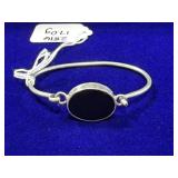 STERLING SILVER BANGLE BRACELET W/ CENTRAL OVAL