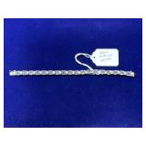 STERLING SILVER & AMETHYST TENNIS STYLE BRACELET -