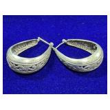 PAIR OF STERLING SILVER OVAL SHAPED FILIGREE HOOP