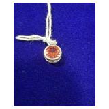 ROUND BEZEL-SET RED-ORANGE GEMSTONE & STERLING