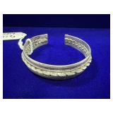 STERLING SILVER CUFF BRACELET W/ BRAIDED ROPE