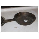 6.5" CAST IRON SKILLET WITH 3 SK H2 ON BOTTOM