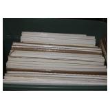 ANOTHER BIN OF SHRINK WRAPPED MATTED ART