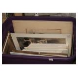 A BIN SLAMMED FULL OF MATTED ART