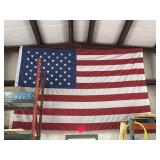 Two American flags one hanging Buyer must take