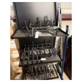 Seven steel bar grates and stand