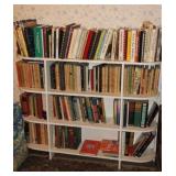 WHITE BOOKCASE WITH VARIOUS BOOKS