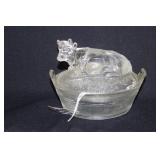 CLEAR GLASS COW ON NEST DISH