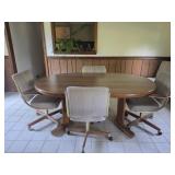 Oak Dining Table w/ 4 Swivel-Tilt Caster Chairs