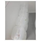 4 PARTIAL 7 GALLON JUGS OF PROPYLENE GLYCOL