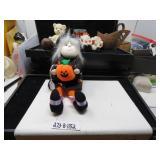 LOT B 1152 LITTLE WITCH HOLDING PUMKIN