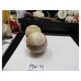 LOT MW 74 TWO BASEBALLS ONE IS SIGNED NOT SURE WHS