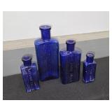 (4) GRADUATED COBALT POISON BOTTLES