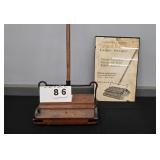 GRAND RAPIDS BISSEL VACUUM WITH ADVERTISEMENT