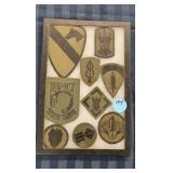 BOX OF MILITARY PATCHES (9)