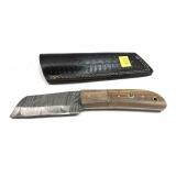 Custom Damascus steel blade knife with embossed
