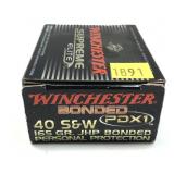 Box of .40 S & W 165-grain JHP bonded personal