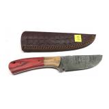 Custom Damascus steel blade knife with embossed