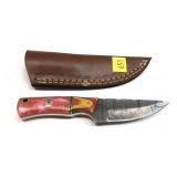 Custom Damascus steel blade knife with embossed