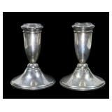 Pair of sterling weighted candle sticks, 5" H.